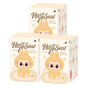Boneco Pop Mart Labubu The Monsters "Have A Seat Vinyl" Blind Box *SORTIDO* unidade